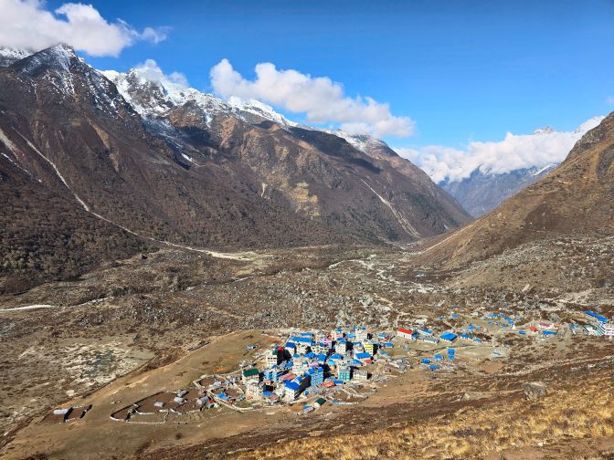 Kyanjin Gompa cradled among snowy peaks, 2025