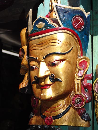 A colored mask, in the Kathmandu Durbar Square Market, 2004