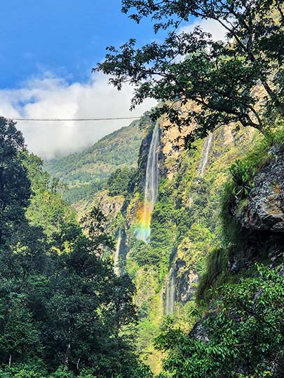 A colorful rainbow at the waterfall between Soti Khola and Machha Khola, 2022