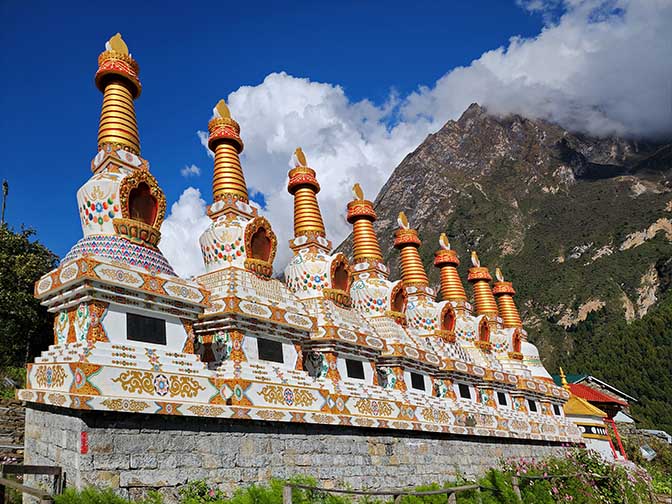 A row of stupas at Tsum Monastery, 2022