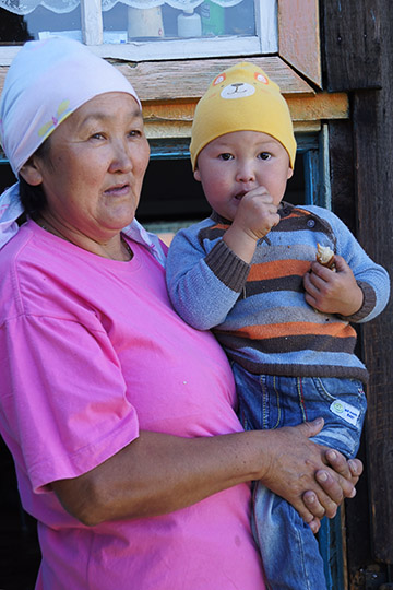 Grandmother and her grandson in Boochi village, 2014