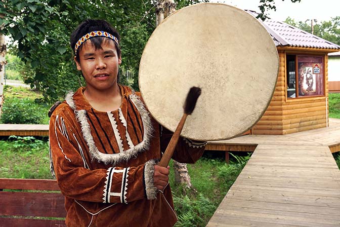 An Even young dancer in traditional costume with a drum, Petropavlovsk Kamchatsky 2016