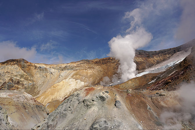 Steam jet and vivid colors in the caldera of Mutnovski active volcano, 2016