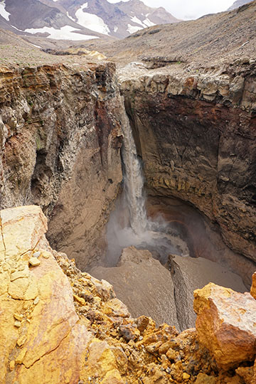 A waterfall in the river which drains the caldera of Mutnovsky Volcano, 2016