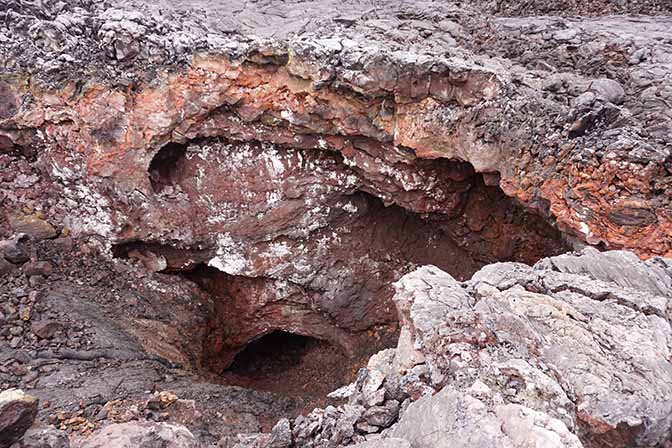 The opening of a lava flow tunnel in Tolbachic Volcano, which was created during 2012-2013 erruption, 2016