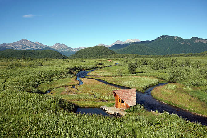 Thermal hot spring in Goryachaya river and wardrobe wooden hut, Nalychevo Valley 2016