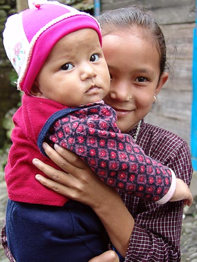 Cheek to cheek in Jiri, along the Khumbu Trail to the Everest, Nepal 2004