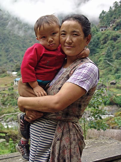 A hug in the Everest Trail Lodge, Yak and Yeti Home in Surke, along the Khumbu Trail to the Everest, Nepal 2004