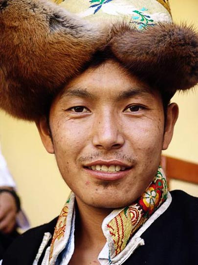 A portrait of a Tibetan dancer at the Karmapa birthday ceremony, in Gyuto Monastery in Sidmbari, Dharamsala, India 2004