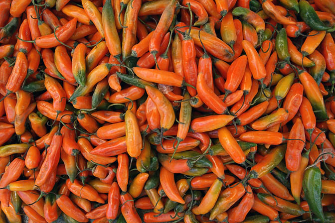 Colorful chili peppers in Huaraz market, Peru 2008