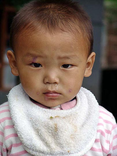Tashi, a cute Tibetan baby, in the Tibetan Children Village in McLeod Ganj, Dharamsala, India 2004