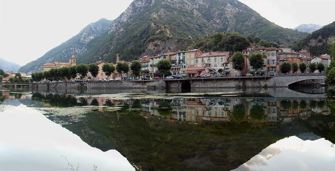 The village of Breil sur Roya and its reftection in the Roya River, France 2011