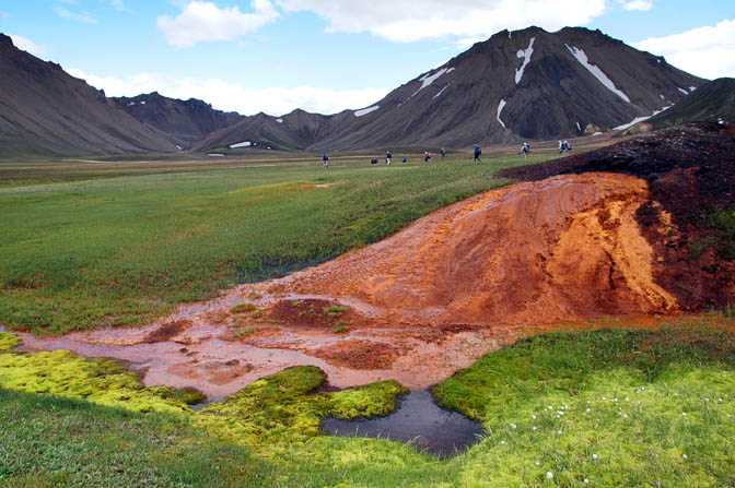 Orange iron oxide, green moss, black volcano and blue sky, 2012