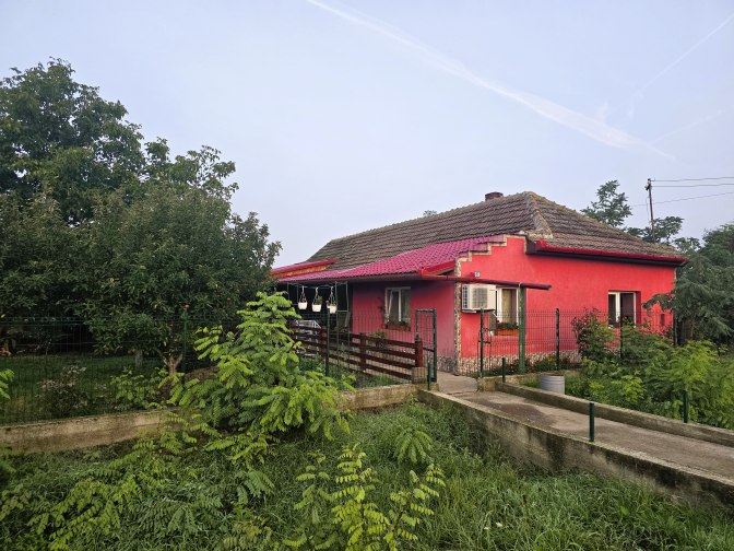 Colorful house in the village, Domanesti 2025