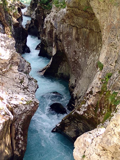 The emerald blue water of the Soca river, carves out a narrow gorge in the living rocks, the Soca Trail 2007