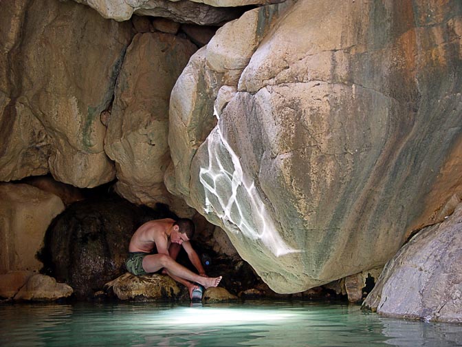 Hod is refilling the bottles at Namer Spring in the Zeelim Creek, 2003