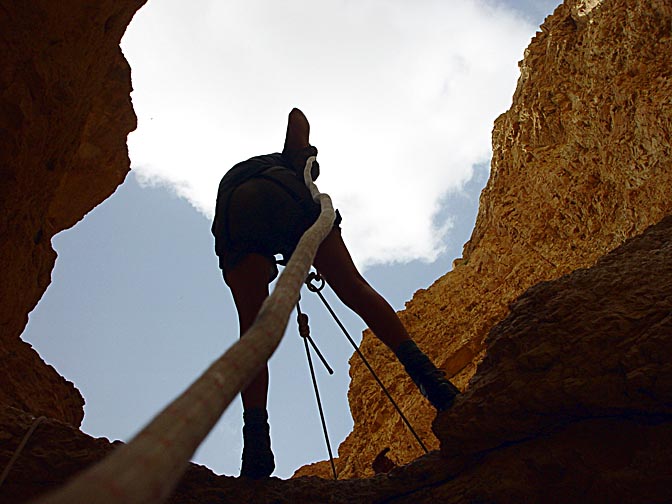 A rappelling (abseiling) silhouette in the Hardoof Creek, 2003