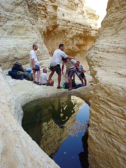 Frolicking at the top of a dry waterfall in Hardoof Creek, 2003
