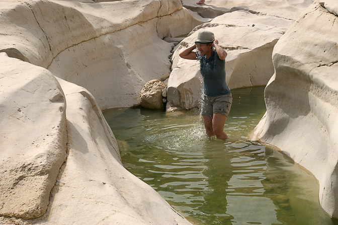 Neta of Shapirit group is freshening up in the water holes of Chemar Creek, 2010
