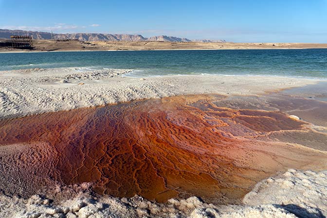 Shallow and colorful salt ponds in the drying Tze'elim Bay, 2021