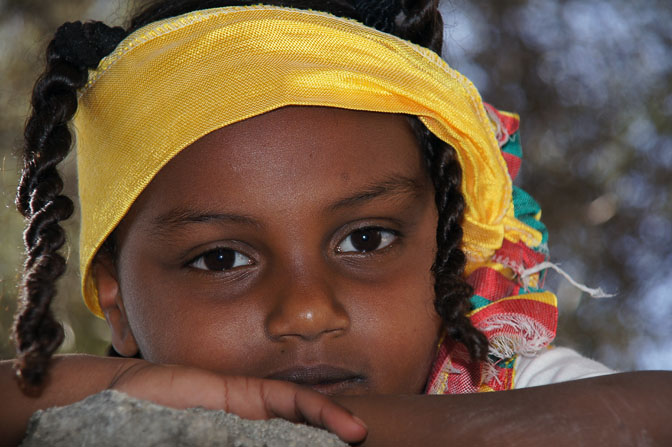 Ethiopian girl dressed in the colors of the Ethiopian flag, in the Ethiopian village of Deir al Sultan, Jerusalem 2012