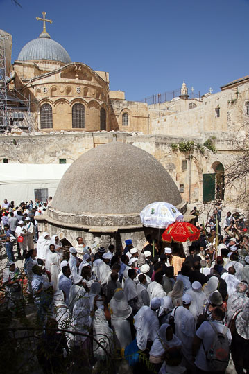 Orthodox Ethiopians circuit a structure in Deir al Sultan, on the roof of the Chapel of St. Helena of the Holy Sepulcher, Jerusalem 2012