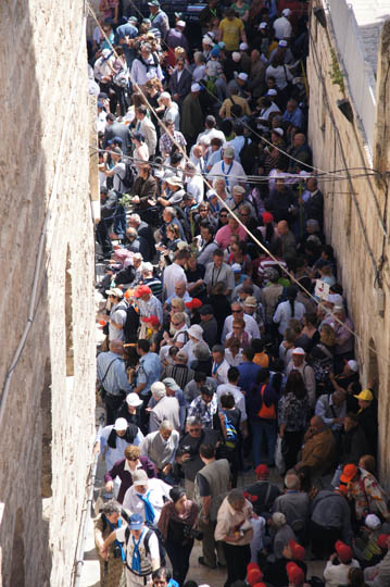 Pilgrims crowding the alleys of the old city  on their way to the Holy Sepulcher, Jerusalem 2012