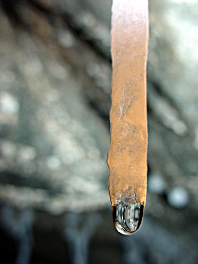 A drop at the end of a salt stalactite in the Colonel cave, Mount Sodom 2002