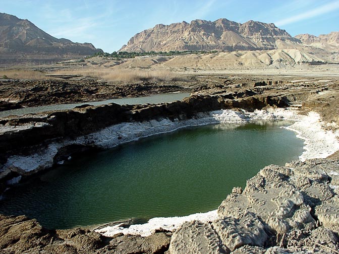 A sinkhole filled with green water, Ein Gedi coast 2003