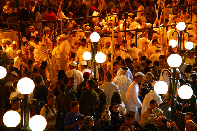 Samaritans, dressed in festive white, sacrifice one year old lambs, Mount Gerizim 2011