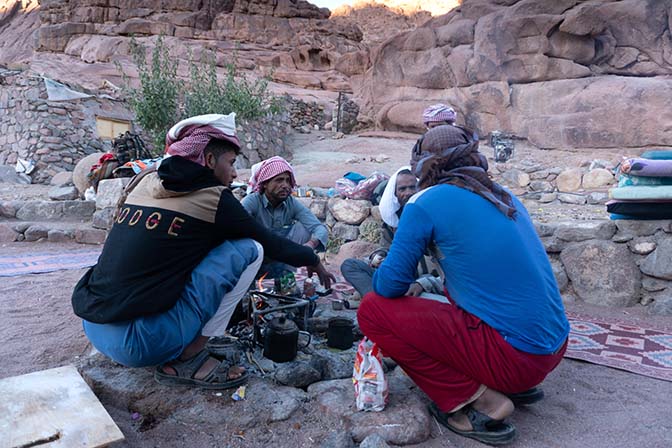 The staff prepares morning tea and coffee at Hussein's bustan (Bedouin garden) in Farsh (small basin) Rummana, 2021