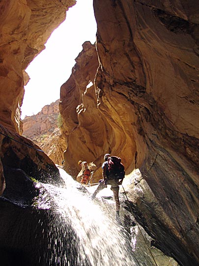 Aviv rappels (abseils) a waterfall in Wadi el Karak, 2007