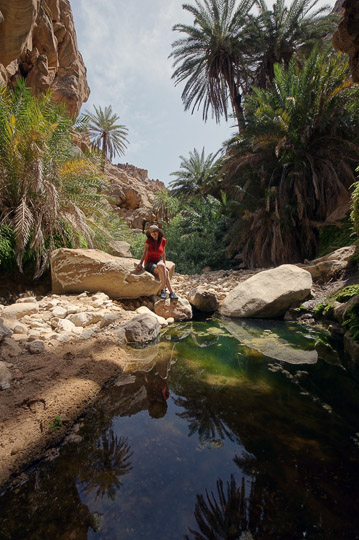 Tanya between pools and the rich vegetation of Wadi Manshala, 2012