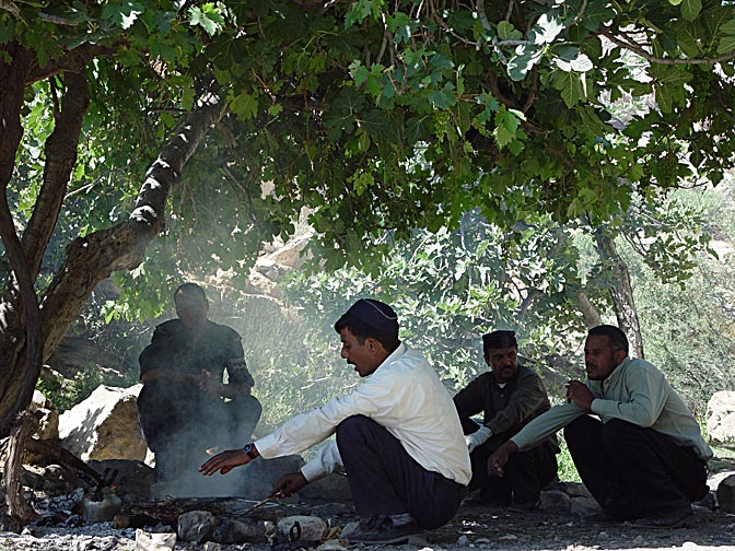 Our hosts prepare for us a rich meal at the entrance to Wadi Shamah, 2003