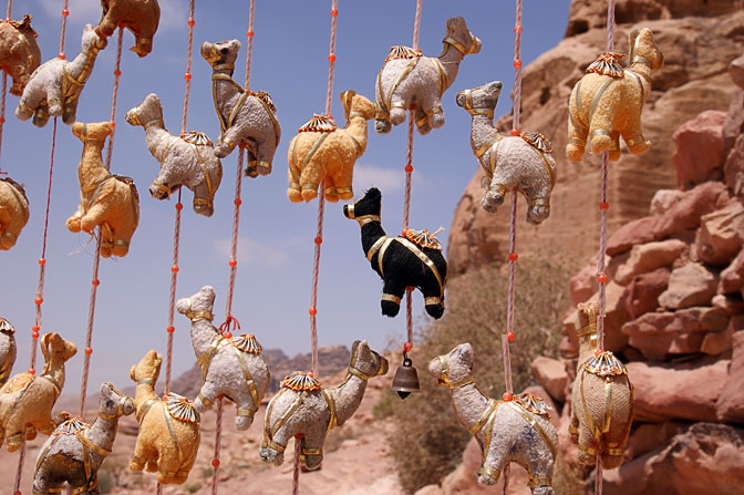 Camels on beaded curtain in a stand at the top of Jabel Al-Madhbah, 2009