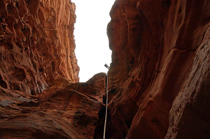 Shlomit rappels (abseils) down the gorge of Jabel Khazali, 2009