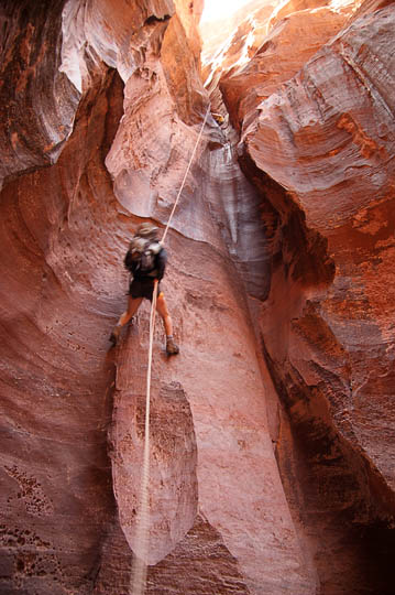 Ami rappels (abseils) down the gorge of Jabel Khazali, 2009