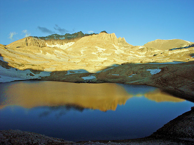 A sunrise reflection in a lake in the Aladaglar uplands, 2002
