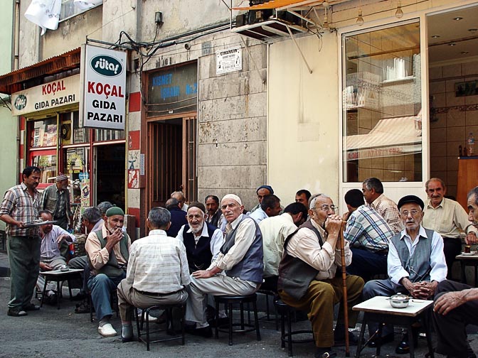 The idlers enjoy the chay (tea), in a tea shop in the streets of Istanbul, 2003