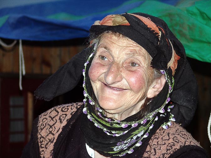 A smiling Turkish woman in Yukari Kavron, 2005