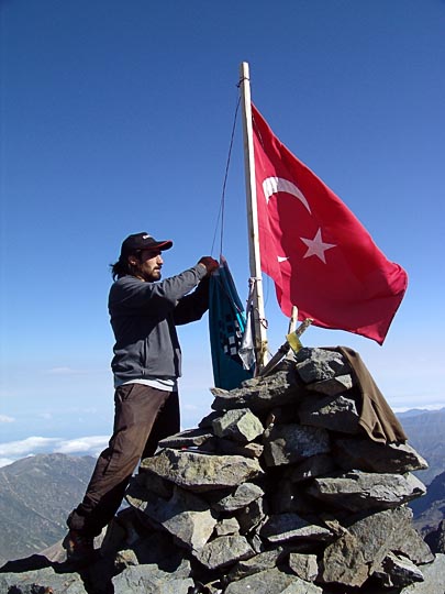 Ali takes care of the Turkish flag in the Kachkar summit, 2005