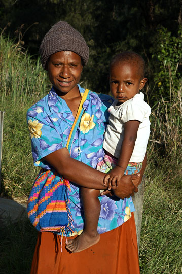 A mother carrying her boy, Watabung 2009