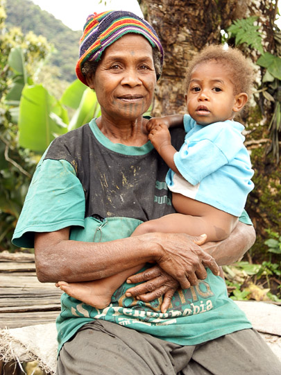 A woman and a baby in a village along the trail, The Kokoda Trek 2009