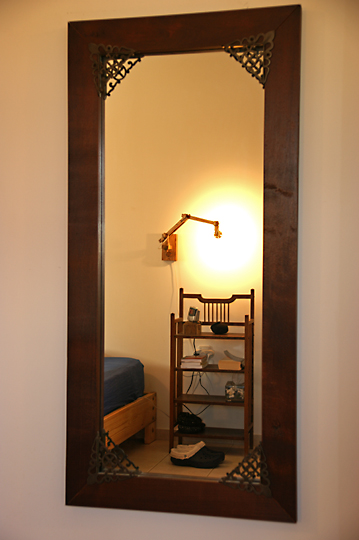 A bedroom reflection in the mirror, 2009