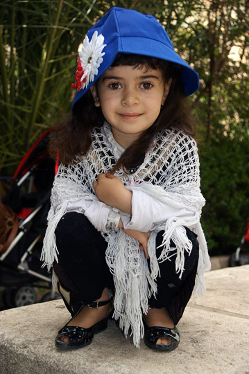 Arina from Iraqi Kurdistan enjoys a stroll in a garden, Jerusalem 2011