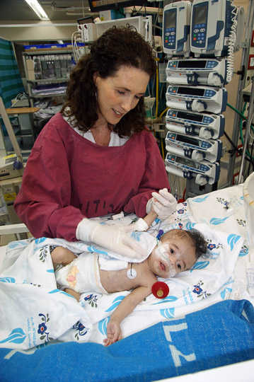 Heart-lung physical therapist massages Rahaf from Gaza, The Wolfson Hospital 2011